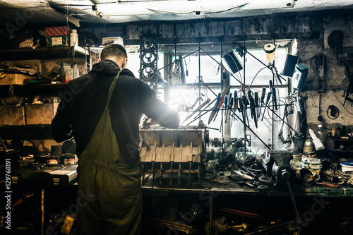 Photography man working in the garage