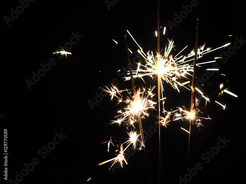 Christmas sparklers in the dark  background for xmas  new year
