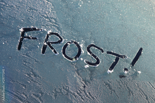 Fototapet Frozen car window with a frost message text sign