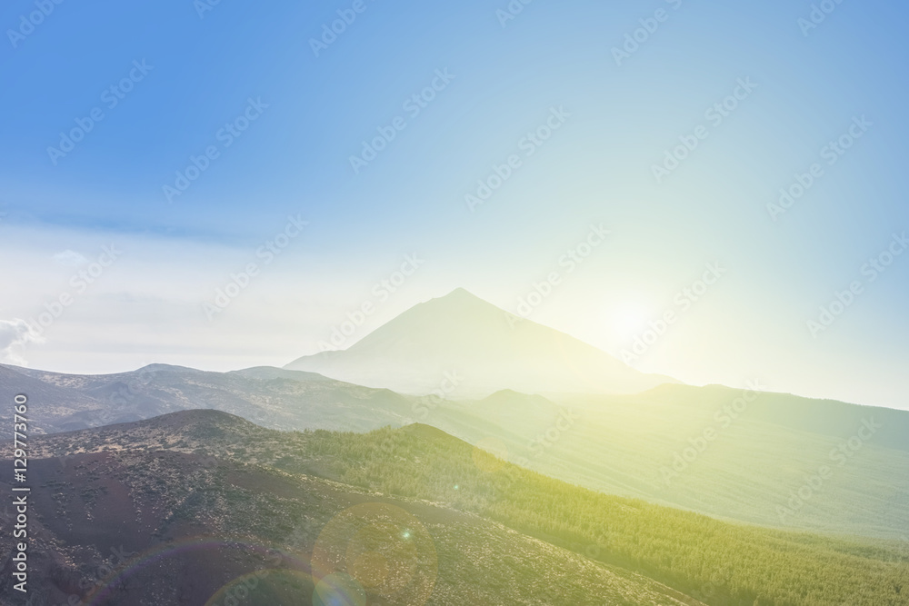 Obraz premium Forest, mountain landscape - blue sky, sun