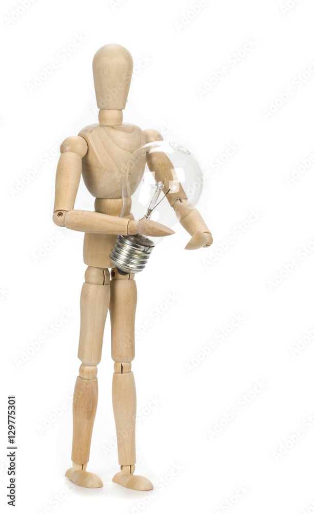wooden dummy and a light bulb wooden dummy and a light bulb