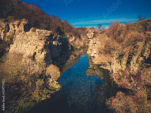 Beautiful lake in the rocks in autumn. Buky canyon, Ukraine photo