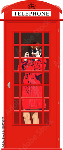 Beautiful young girl in bright clothes speak the English classic red phone booth