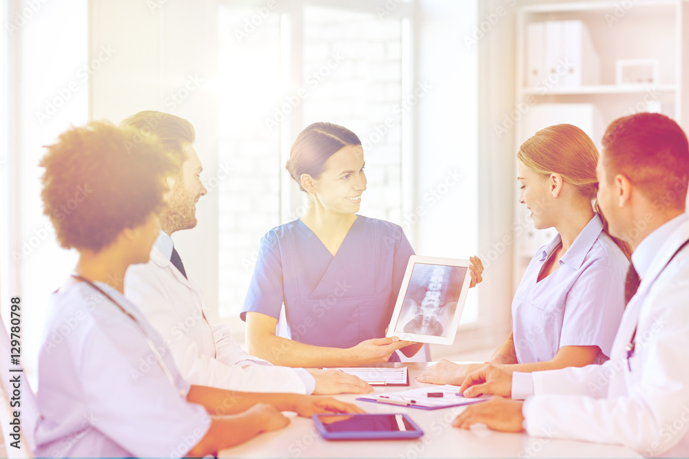group of happy doctors meeting at hospital office group of happy doctors meeting at hospital office