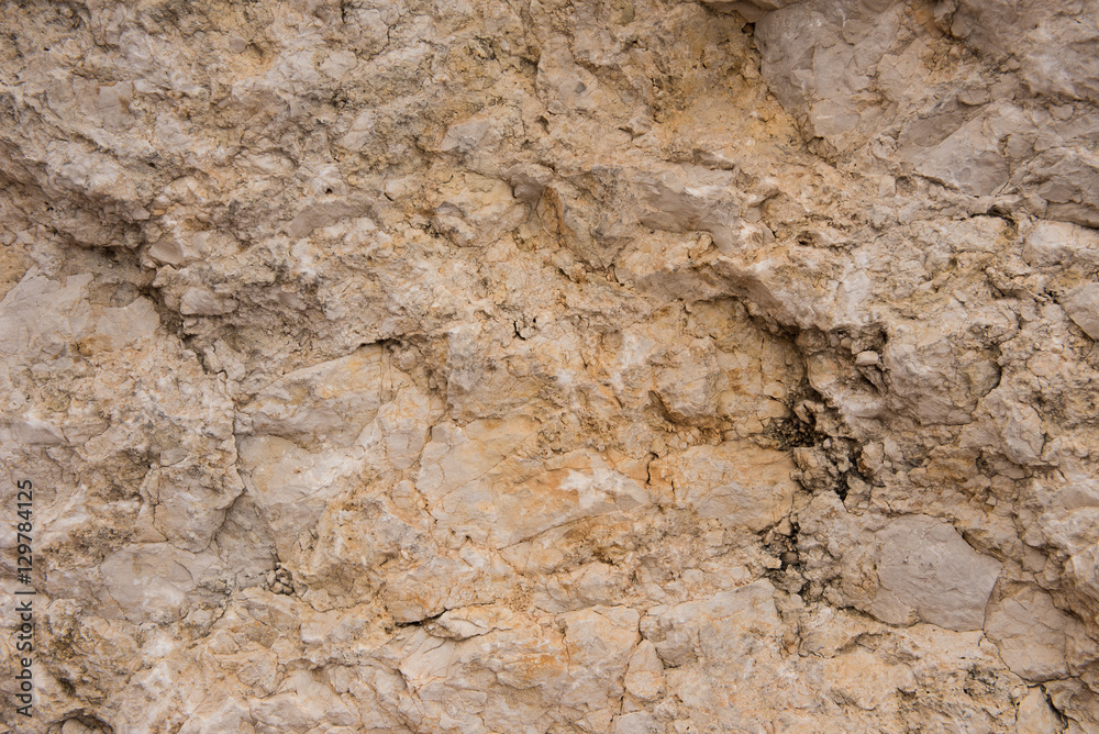 Background quarried rough textured limestone rock Background quarried rough textured limestone rock