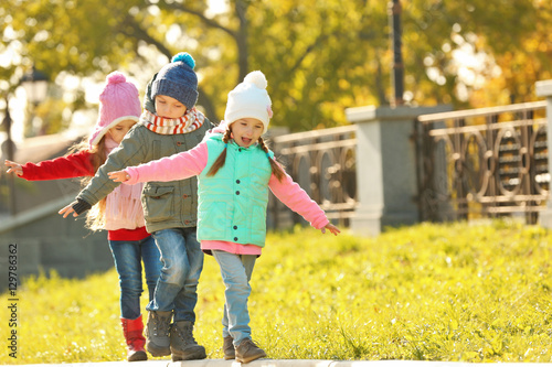Group of children having fu...