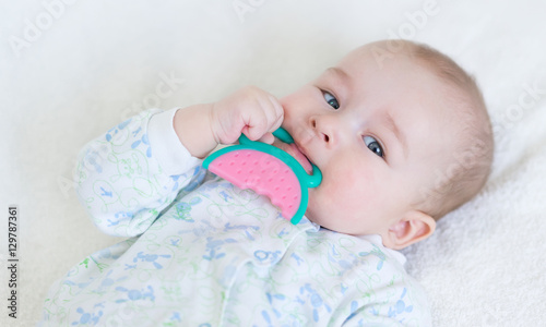 Billede på lærred painful teething in infants, baby close-up with a toy.