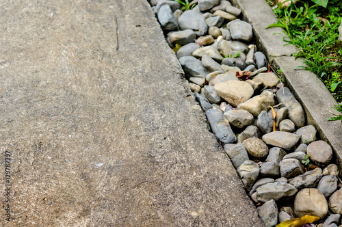 rainwater drainage system walkway build by pebbles in a park