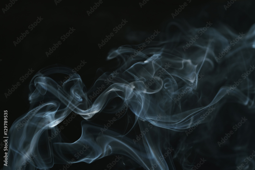 Fototapeta premium real blue smoke over black background, abstract backdrop
