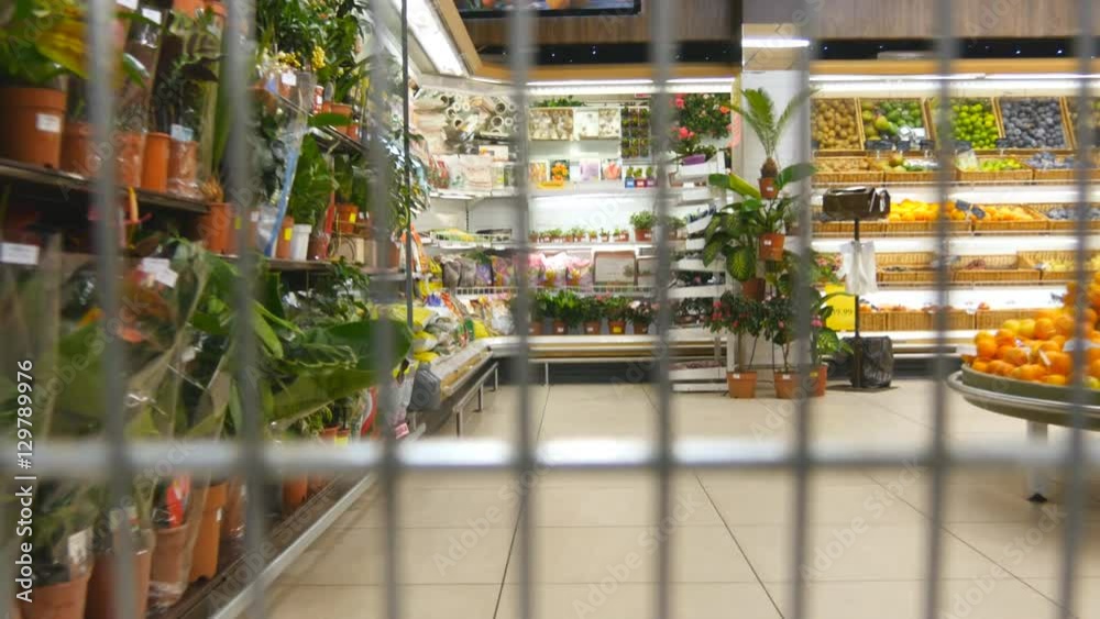 Supermarket cart riding throuth shop. Camera inside trolley going through grocery store.