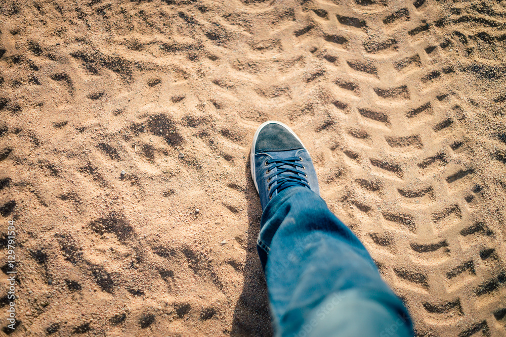 Fototapeta premium Legs on the the desert sands