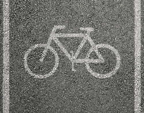 Bicycle sign on asphalt