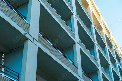 big balcony building with shadows and sunlight