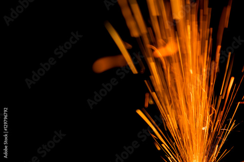 Beautiful line light of Christmas and New Year party burning sparkler circle style on black background.