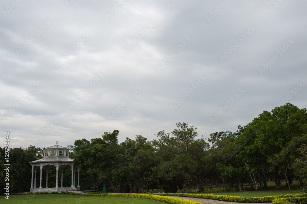 White pavilion in the garden. White pavilion in the garden.