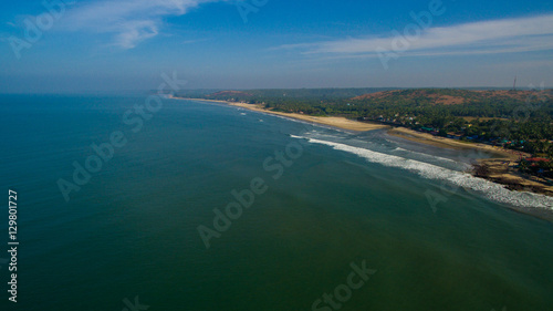 Kalacha beach on sunset. India in Goa. Aerial