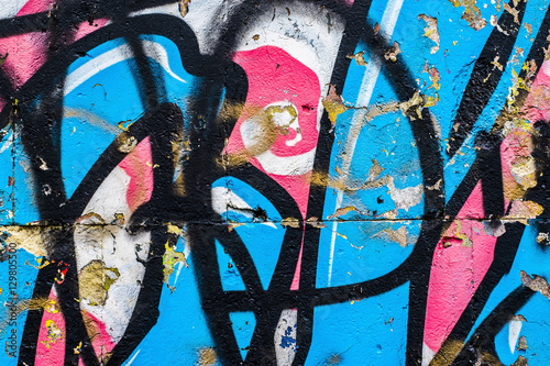 Fragment of a wall with graffiti. Abstract background