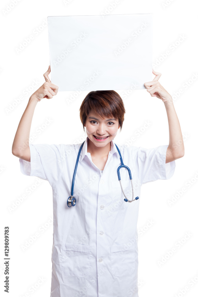 Young Asian female doctor show a blank sign over head. Young Asian female doctor show a blank sign over head.