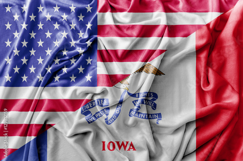 Ruffled waving United States of America and Iowa flag photo