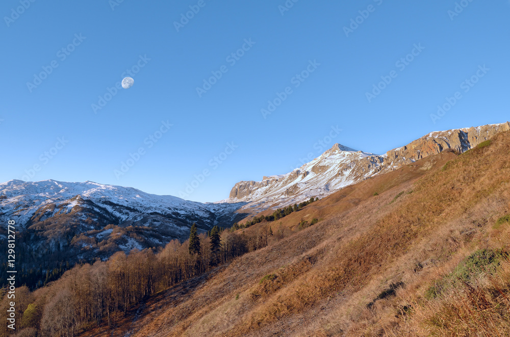 Dawn and moon in the Caucasus Mountains. Dawn and moon in the Caucasus Mountains.