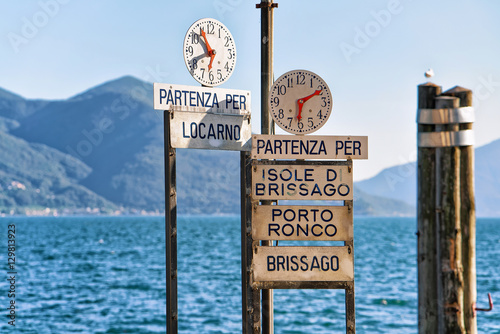 Clock at Pier of Ascona resort of Ticino canton Switzerland photo