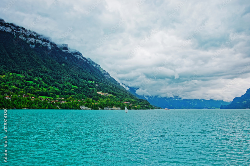 Sailboat on Lake Brienz and Brienzer Rothorn mountain Bern Swiss