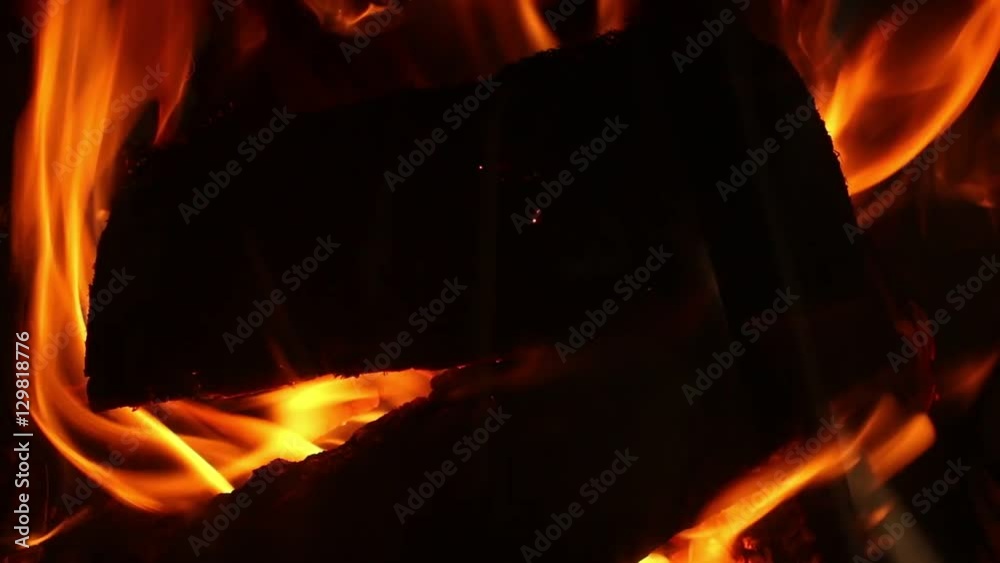 Burning wood logs in fireplace. Burning Fire background Burning wood logs in fireplace. Burning Fire background