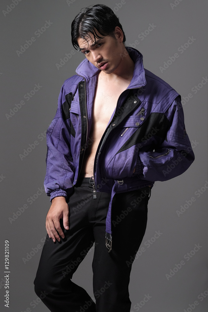 Asian man in purple jacket - Fashion and style Stock Photo