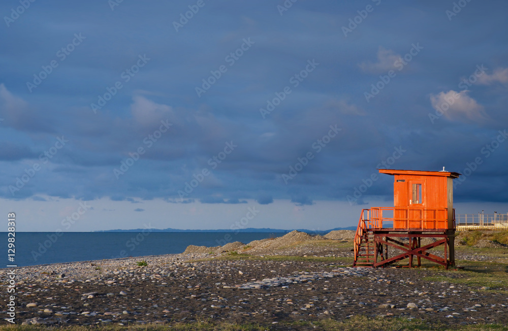 Orange lifeguard station on empty beach of Batumi,Georgia Orange lifeguard station on empty beach of Batumi,Georgia