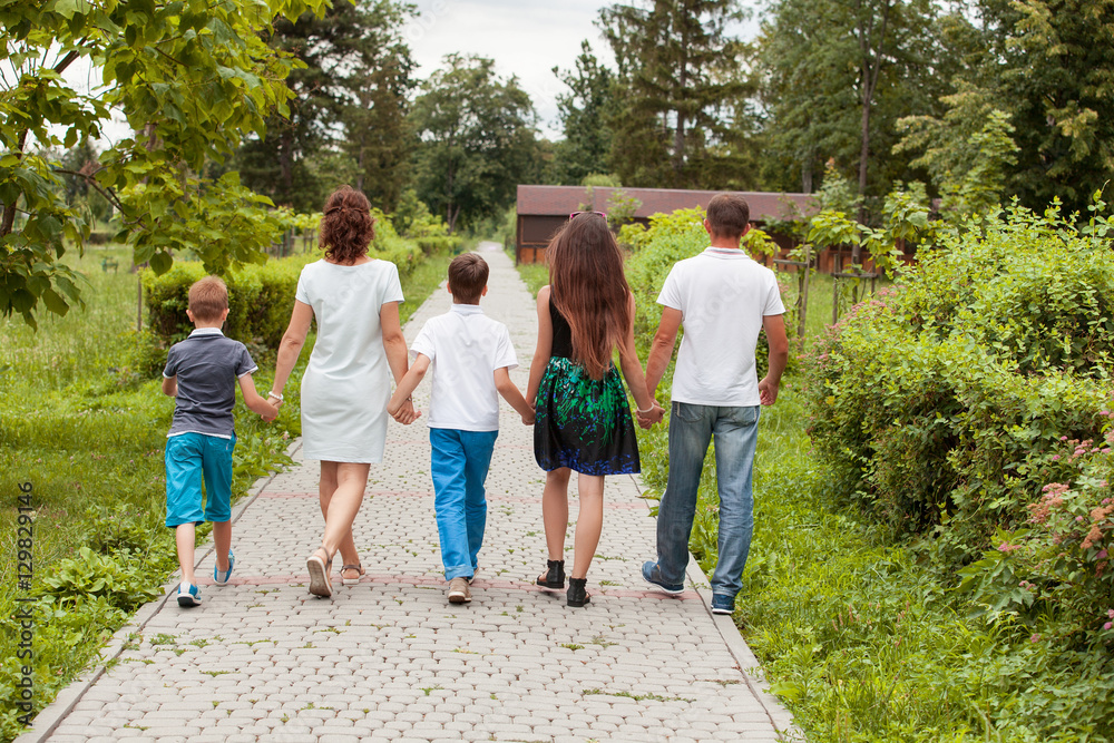 Happy family the vacationer in park Happy family the vacationer in park