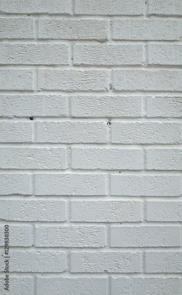 Brick wall painted white to provide a background for your text or images Brick wall painted white to provide a background for your text or images
