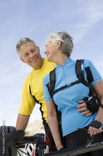 Senior couple in sportswear smiling