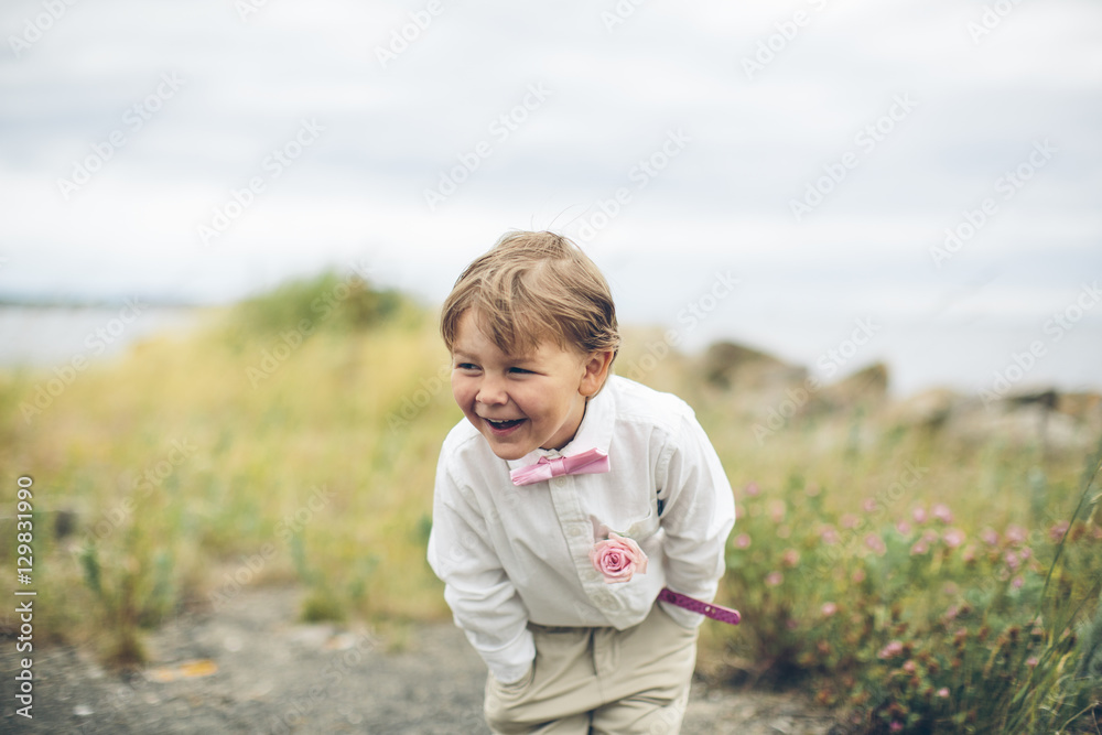 Sweden, Blekinge, Karlskrona, Aspo, Well dressed boy (6-7) smiling Sweden, Blekinge, Karlskrona, Aspo, Well dressed boy (6-7) smiling