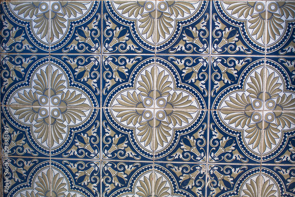 Fragment of portuguese traditional tiles Azulejo with pattern in old Porto, Portugal.