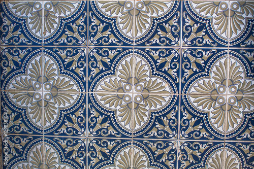 Fragment of portuguese traditional tiles Azulejo with pattern in old Porto, Portugal.