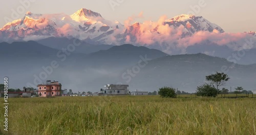 Mountain peaks in sunrise light