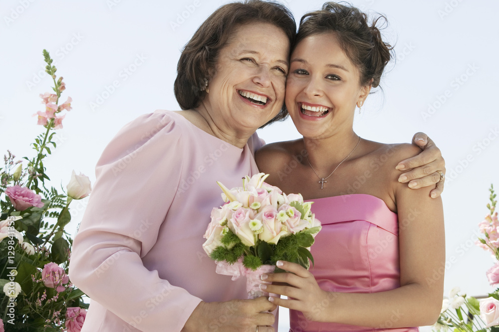 Mother and Bride with bouquet outdoors (portrait) Mother and Bride with bouquet outdoors (portrait)