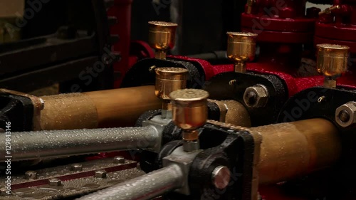 Wallpaper Mural An ultra closeup view of three pistons of an outdoor hydraulic engine
 Torontodigital.ca