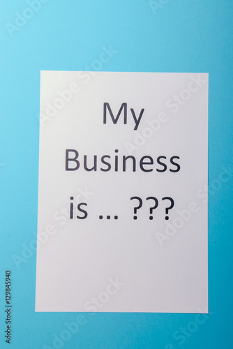 Business word with business document paper on blue background