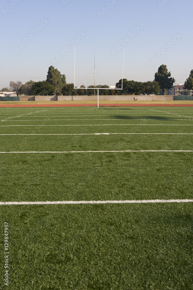 American football field with goal post in background