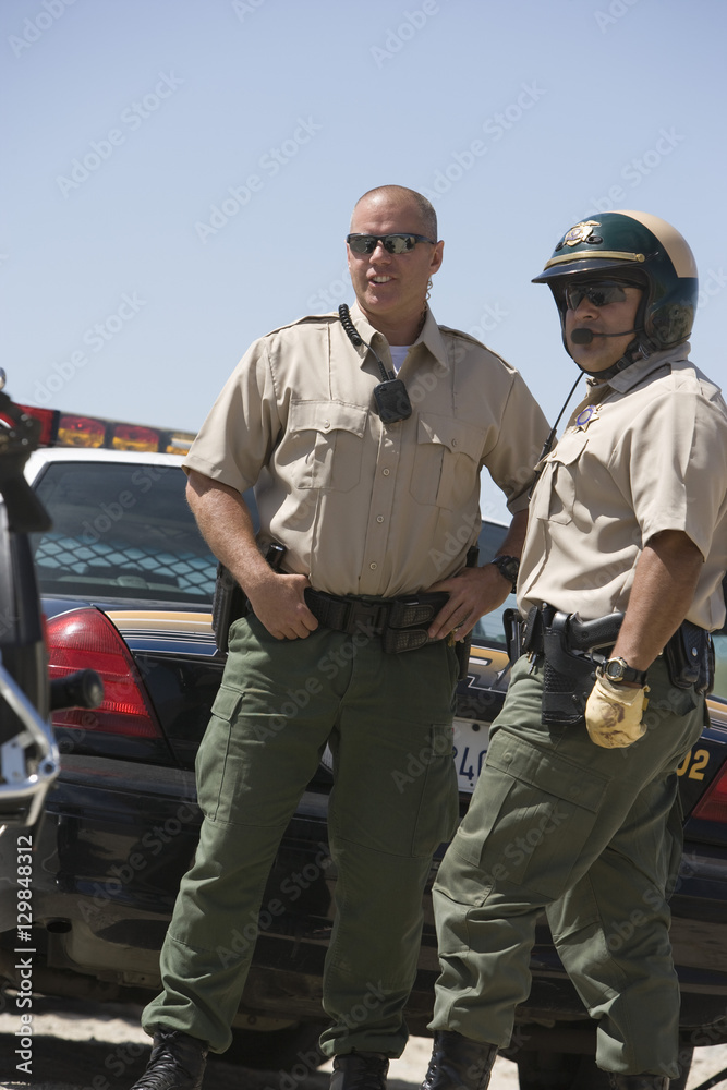 Fototapeta premium Male traffic officers standing together