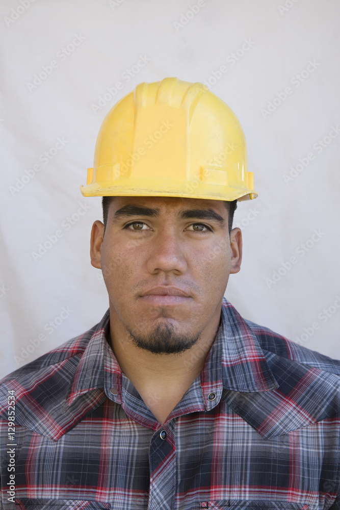 Portrait of a man wearing hardhat isolated on white background Portrait of a man wearing hardhat isolated on white background