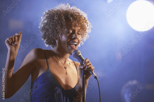 Beautiful Afro American jazz singer on stage photo