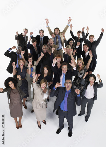 Full length group portrait of excited multiethnic businesspeople against white background