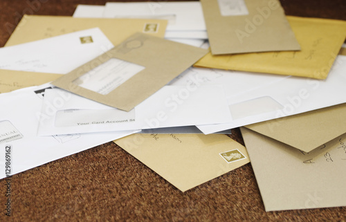 Photography Closeup of a pile of mail on doormat