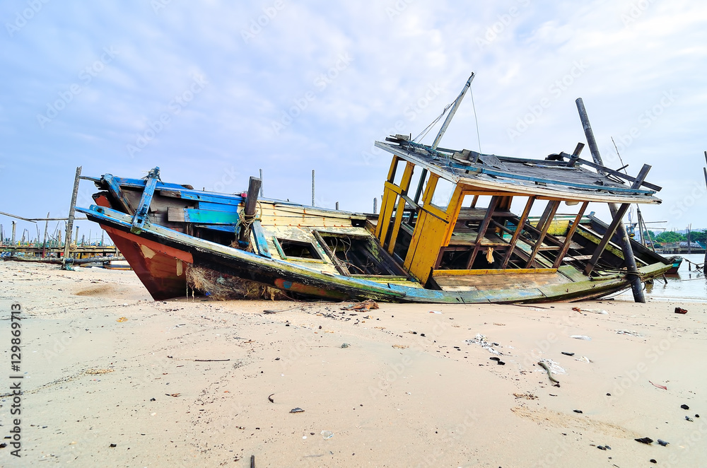 Fototapeta Abandoned boat at boat jetty