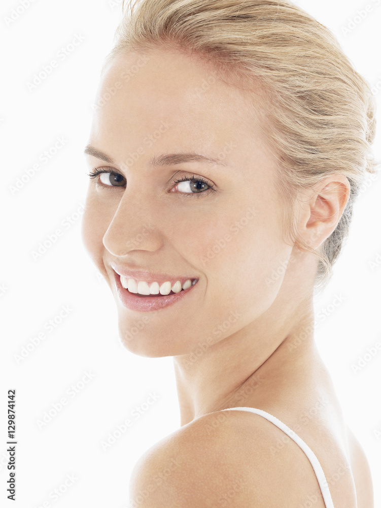 Closeup portrait of a beautiful young blond woman with clean face Closeup portrait of a beautiful young blond woman with clean face