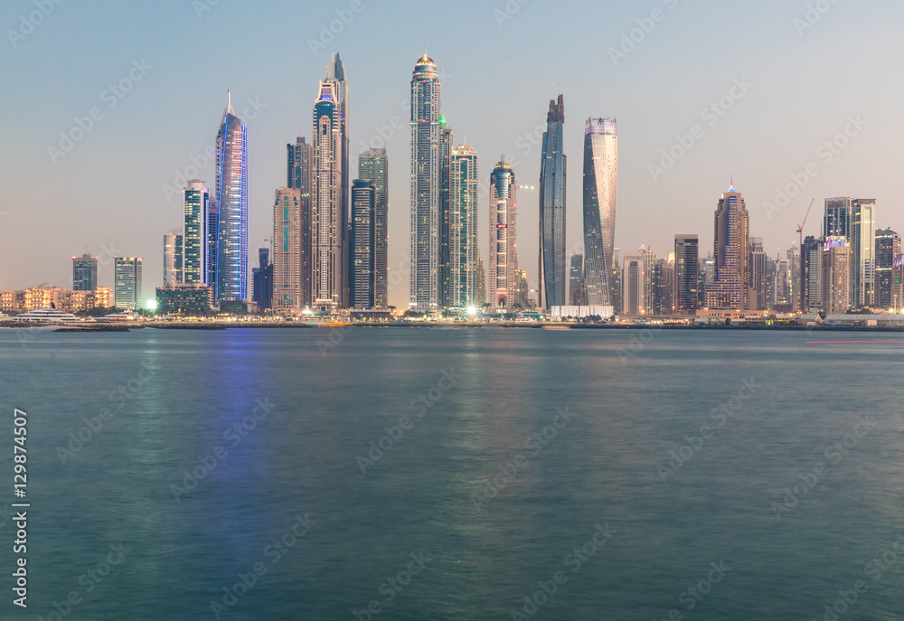 Fototapeta premium Fraction of Dubai skyline in the Marina district at sunset.