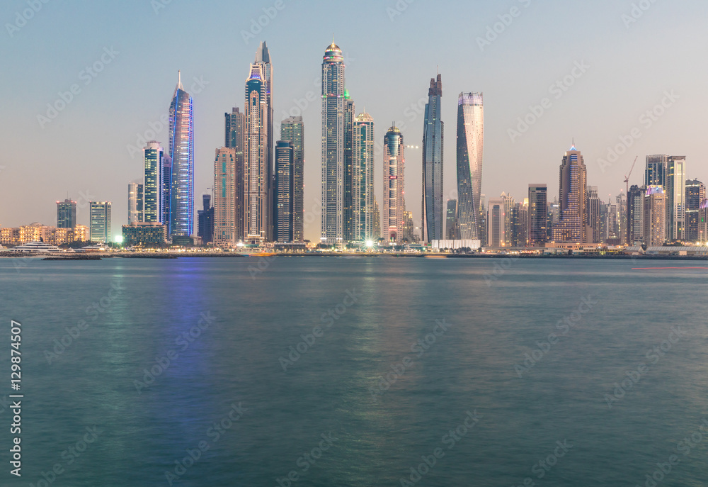 Fraction of Dubai skyline in the Marina district at sunset.