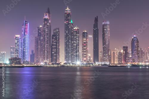 Fraction of Dubai skyline in the Marina district at sunset.